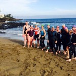 De groep op het strand